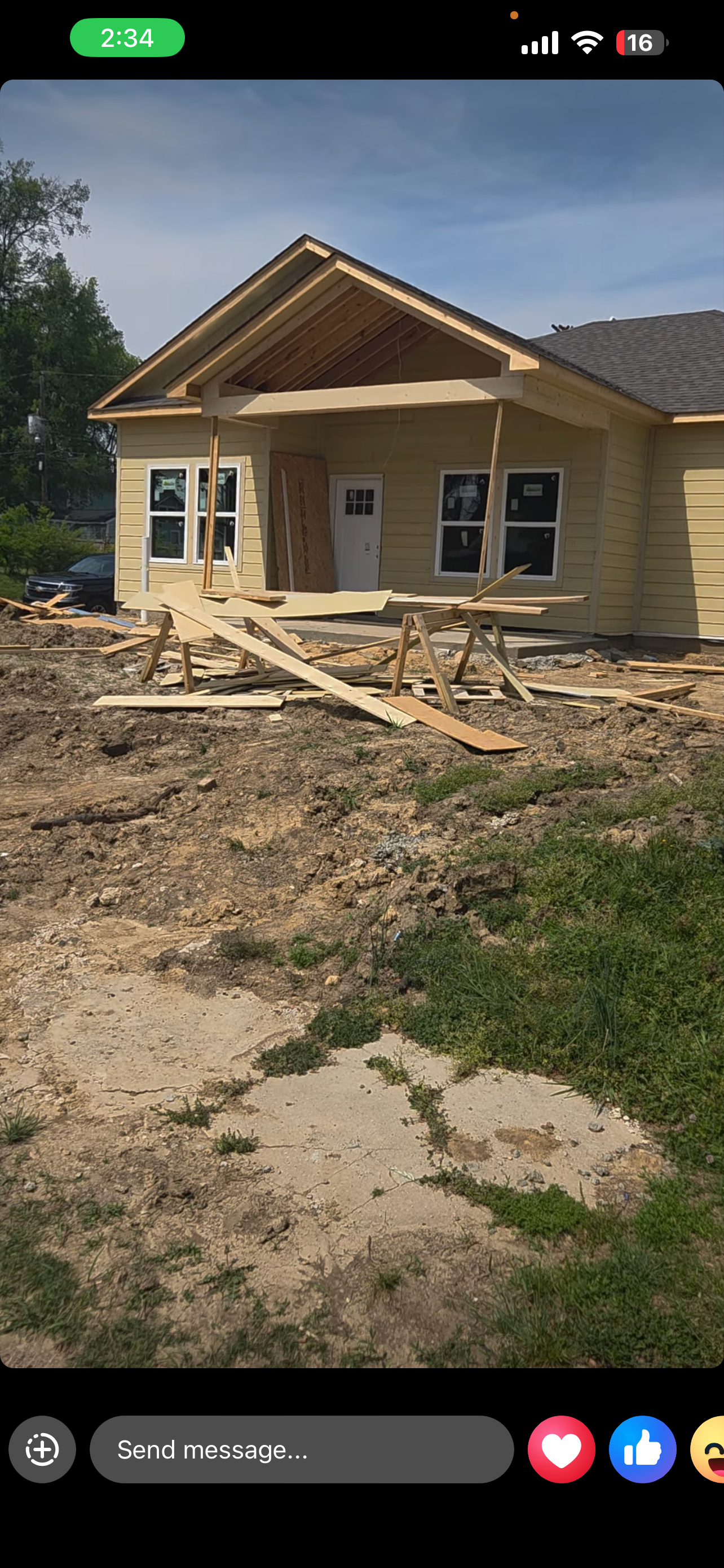 Front elevation — craftsman-style exterior with covered porch taking shape