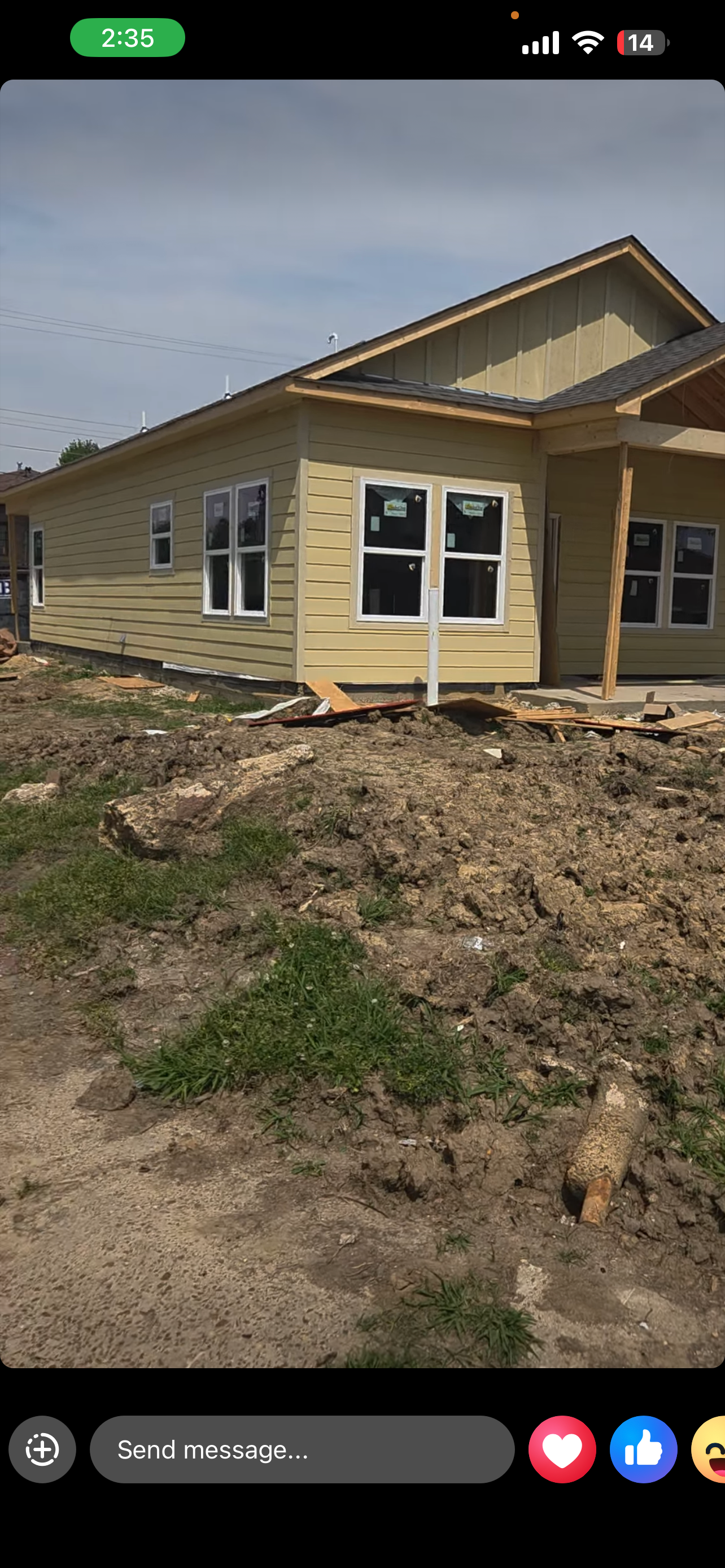 Rear angle — siding and windows complete
